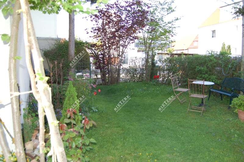 ARI-9322-Garten-1 - Vermietete DHH mit Garten und Garage in Ortsrandlage
